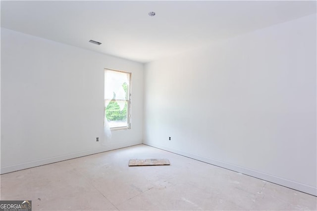 4222 Matisse Ln, Fairburn, GA 30213 - spare room with concrete flooring and baseboards