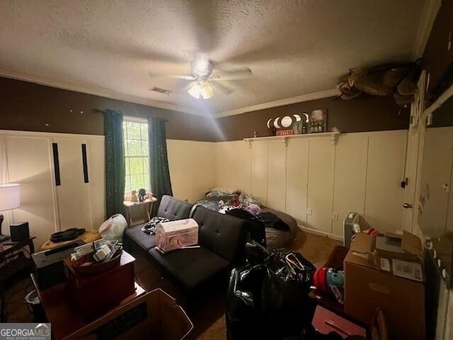 118 High Ridge Ln, Dahlonega, GA 30533 - bedroom with ornamental molding, a textured ceiling, and a ceiling fan