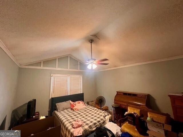 118 High Ridge Ln, Dahlonega, GA 30533 - bedroom with lofted ceiling, a textured ceiling, ornamental molding, and ceiling fan