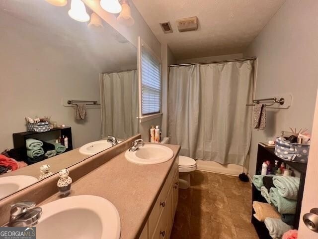 118 High Ridge Ln, Dahlonega, GA 30533 - full bathroom featuring double vanity and toilet