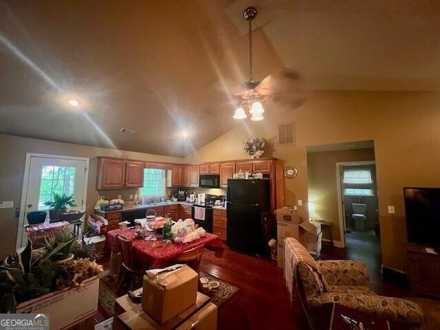 118 High Ridge Ln, Dahlonega, GA 30533 - kitchen featuring black appliances, lofted ceiling, ceiling fan, dark wood finished floors, and decorative light fixtures
