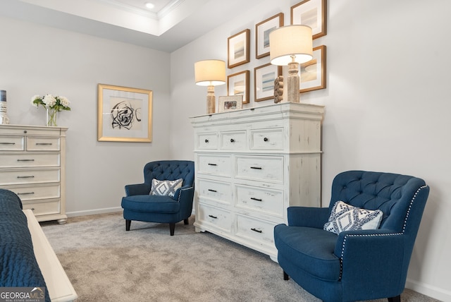 living area featuring ornamental molding, light carpet, baseboards, a tray ceiling, and recessed lighting