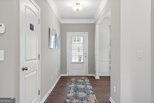 entryway featuring dark wood-type flooring, crown molding, and baseboards