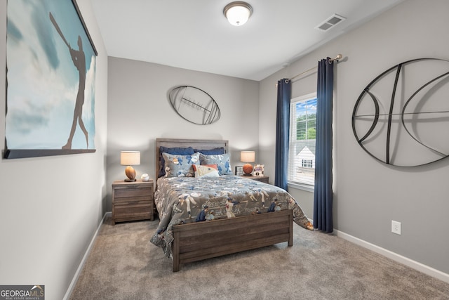 bedroom with carpet and baseboards