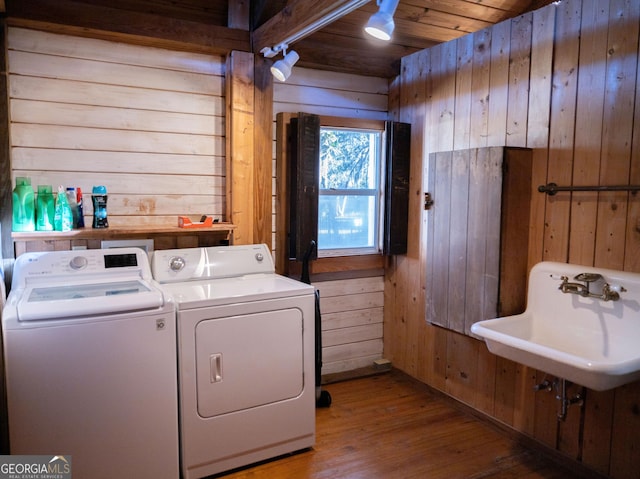 309 Mahan St, Saint Marys, GA 31558 - clothes washing area with wood walls, washer and dryer, wood finished floors, and wooden ceiling