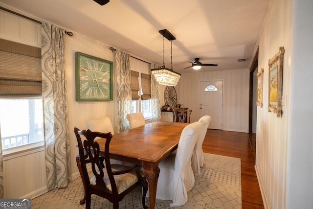 309 Mahan St, Saint Marys, GA 31558 - dining room featuring ceiling fan, wood finished floors, and baseboards