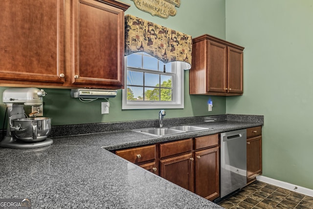 108 Wortham Dr, Buckhead, GA 30625 - kitchen with stainless steel dishwasher, a sink, and dark countertops