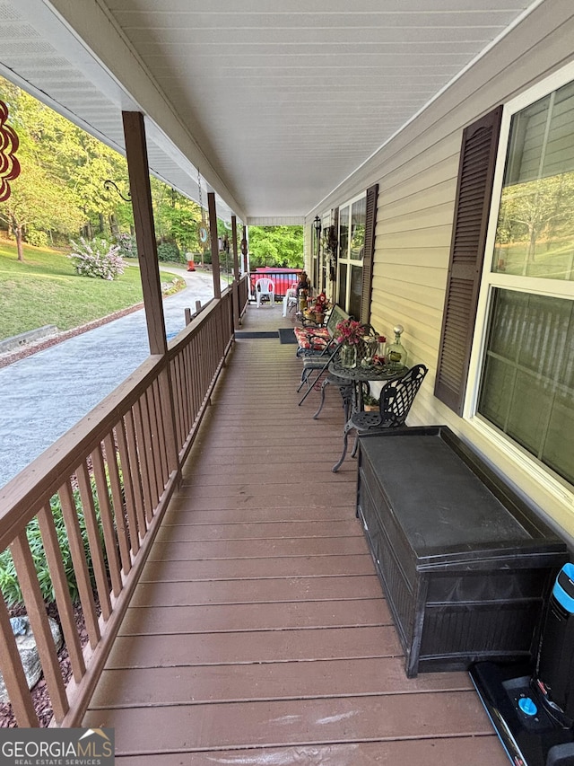 wooden deck featuring a porch