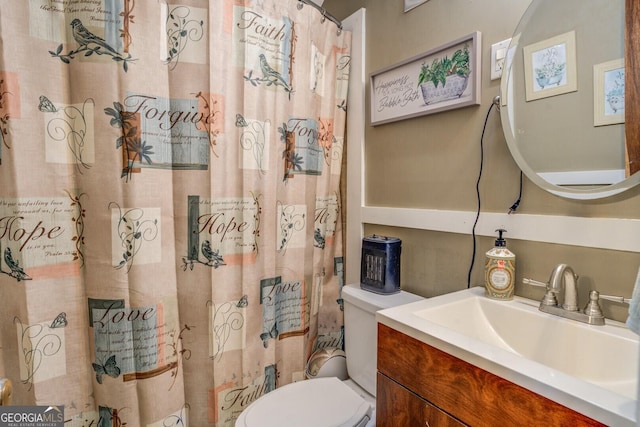 3449 Archwood Dr, Doraville, GA 30340 - full bathroom with toilet, vanity, and a shower with shower curtain