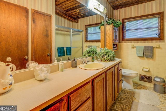 3449 Archwood Dr, Doraville, GA 30340 - bathroom with wallpapered walls, toilet, vanity, and a stall shower