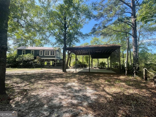 750 Warners Lndg, Hortense, GA 31543 - view of yard featuring stairs and a detached carport