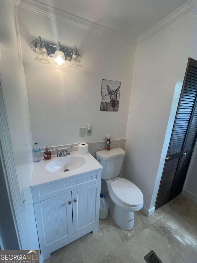 750 Warners Lndg, Hortense, GA 31543 - bathroom featuring crown molding, vanity, and toilet