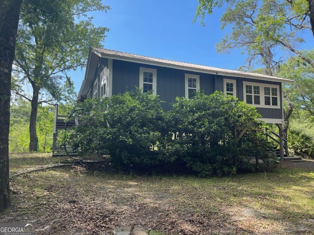 750 Warners Lndg, Hortense, GA 31543 - view of front of house with stairs and metal roof