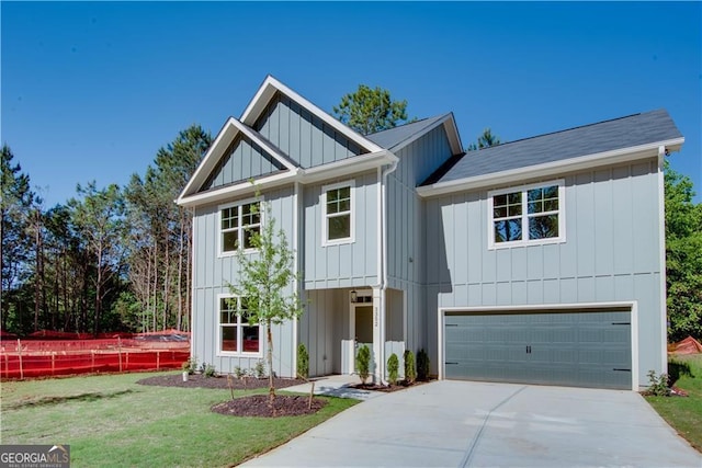 3352 Landings S Dr, Atlanta, GA 30331 - modern farmhouse with concrete driveway, a garage, and board and batten siding