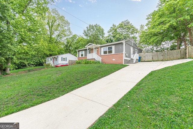 947 Rebel Forest Dr, Atlanta, GA 30315 - bungalow-style home with brick siding and driveway