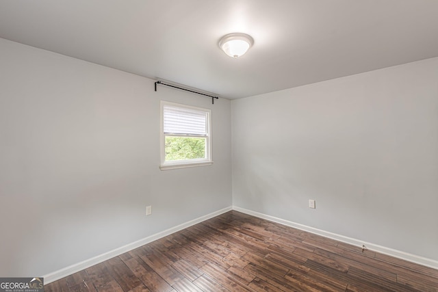 947 Rebel Forest Dr, Atlanta, GA 30315 - unfurnished room featuring baseboards and dark wood-style flooring