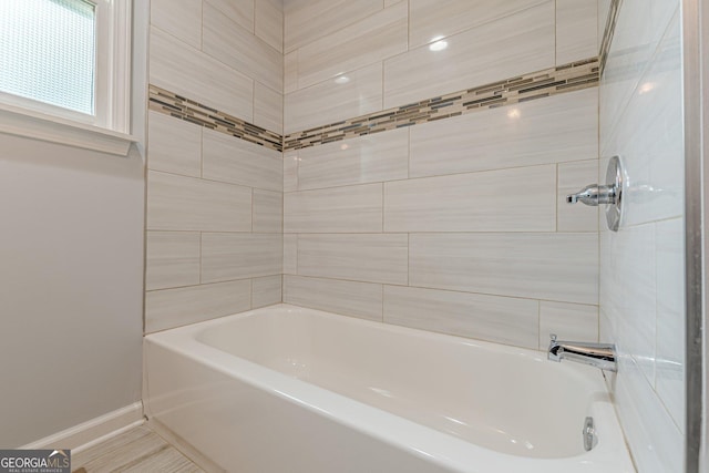 947 Rebel Forest Dr, Atlanta, GA 30315 - bathroom featuring baseboards and shower / tub combination