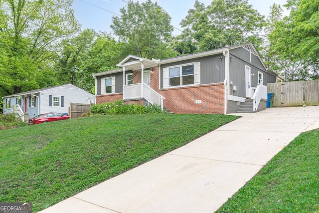 947 Rebel Forest Dr, Atlanta, GA 30315 - view of front of property featuring brick siding, concrete driveway, a gate, and crawl space