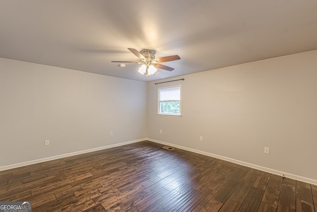 947 Rebel Forest Dr, Atlanta, GA 30315 - empty room featuring ceiling fan, baseboards, and dark wood finished floors