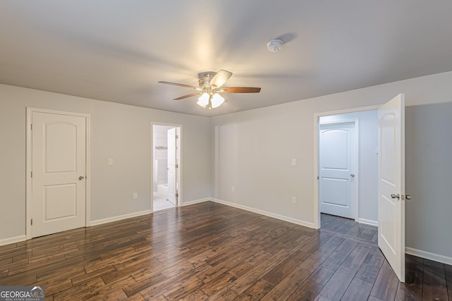 947 Rebel Forest Dr, Atlanta, GA 30315 - empty room featuring a ceiling fan, dark wood-type flooring, baseboards, and a smoke detector