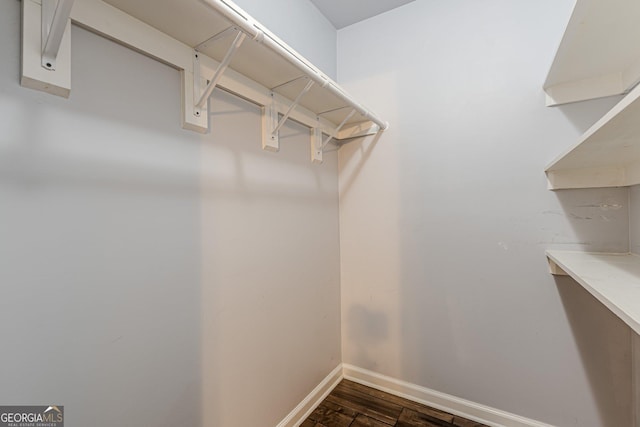947 Rebel Forest Dr, Atlanta, GA 30315 - walk in closet with dark wood finished floors