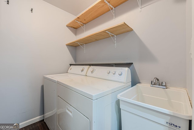 947 Rebel Forest Dr, Atlanta, GA 30315 - clothes washing area with washer and dryer, baseboards, and dark wood-type flooring