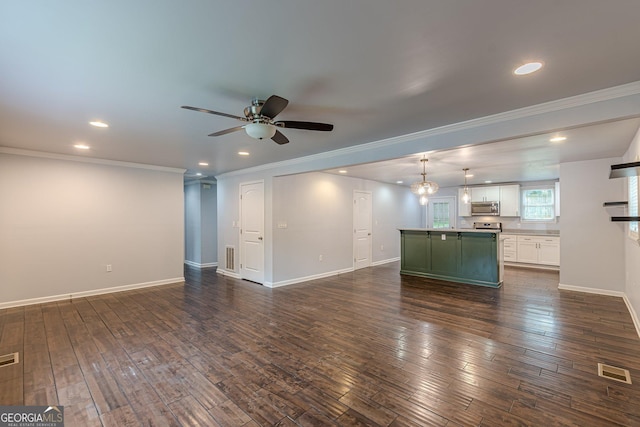 947 Rebel Forest Dr, Atlanta, GA 30315 - unfurnished living room with a ceiling fan, ornamental molding, recessed lighting, baseboards, and dark wood-style floors