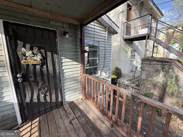 doorway to property featuring cooling unit