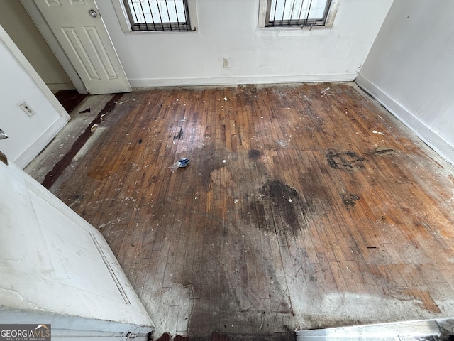 detailed view of wood finished floors and baseboards