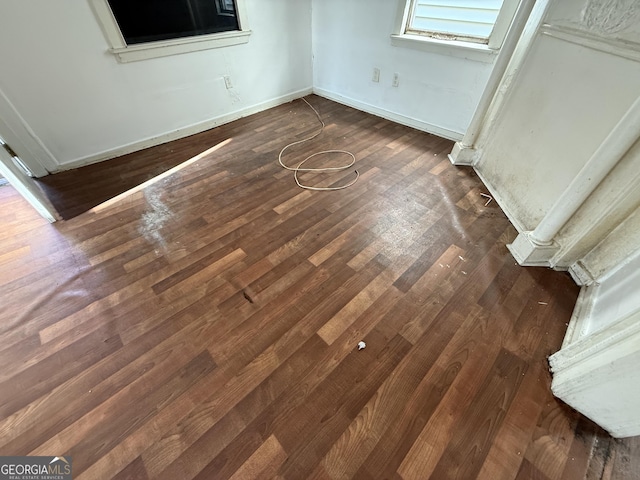detailed view of wood finished floors and baseboards
