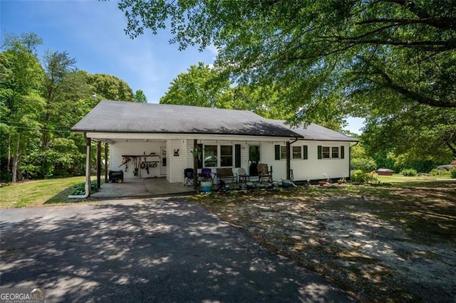 5519 Latty Rd, Lula, GA 30554 - ranch-style home with asphalt driveway and a carport