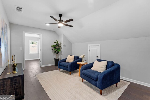 985 Columbia Dr, Decatur, GA 30030 - sitting room with a ceiling fan, dark wood-style flooring, vaulted ceiling, and baseboards