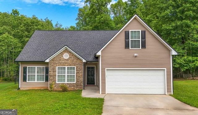 416 Clarion Dr, Carrollton, GA 30116 - view of front of property with stone siding, concrete driveway, a front yard, and a garage