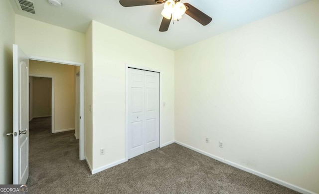 416 Clarion Dr, Carrollton, GA 30116 - unfurnished bedroom with carpet flooring, baseboards, a closet, and ceiling fan