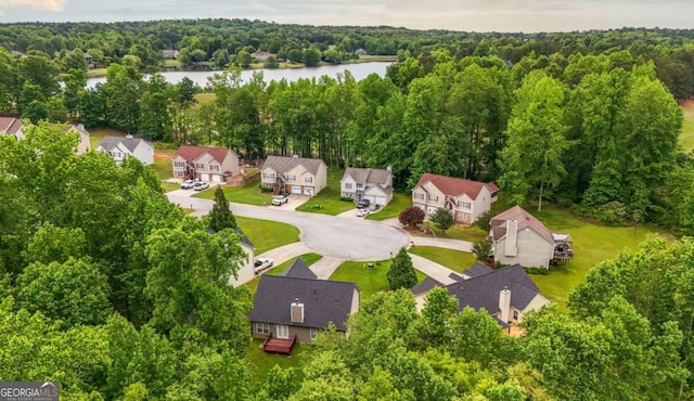 416 Clarion Dr, Carrollton, GA 30116 - aerial view of residential area with a nearby body of water and a heavily wooded area