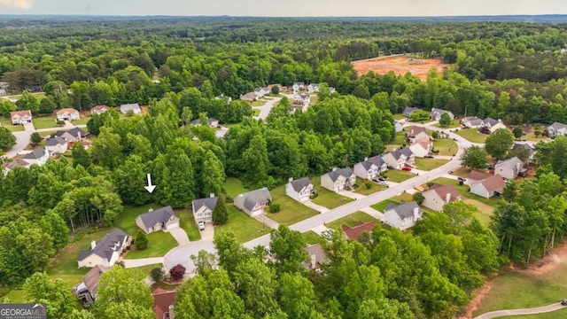 416 Clarion Dr, Carrollton, GA 30116 - aerial perspective of suburban area with a heavily wooded area