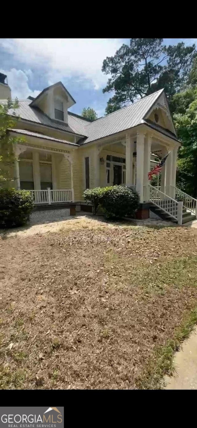 4922 Van Cise Ln, Albany, GA 31721 - view of side of home with a porch