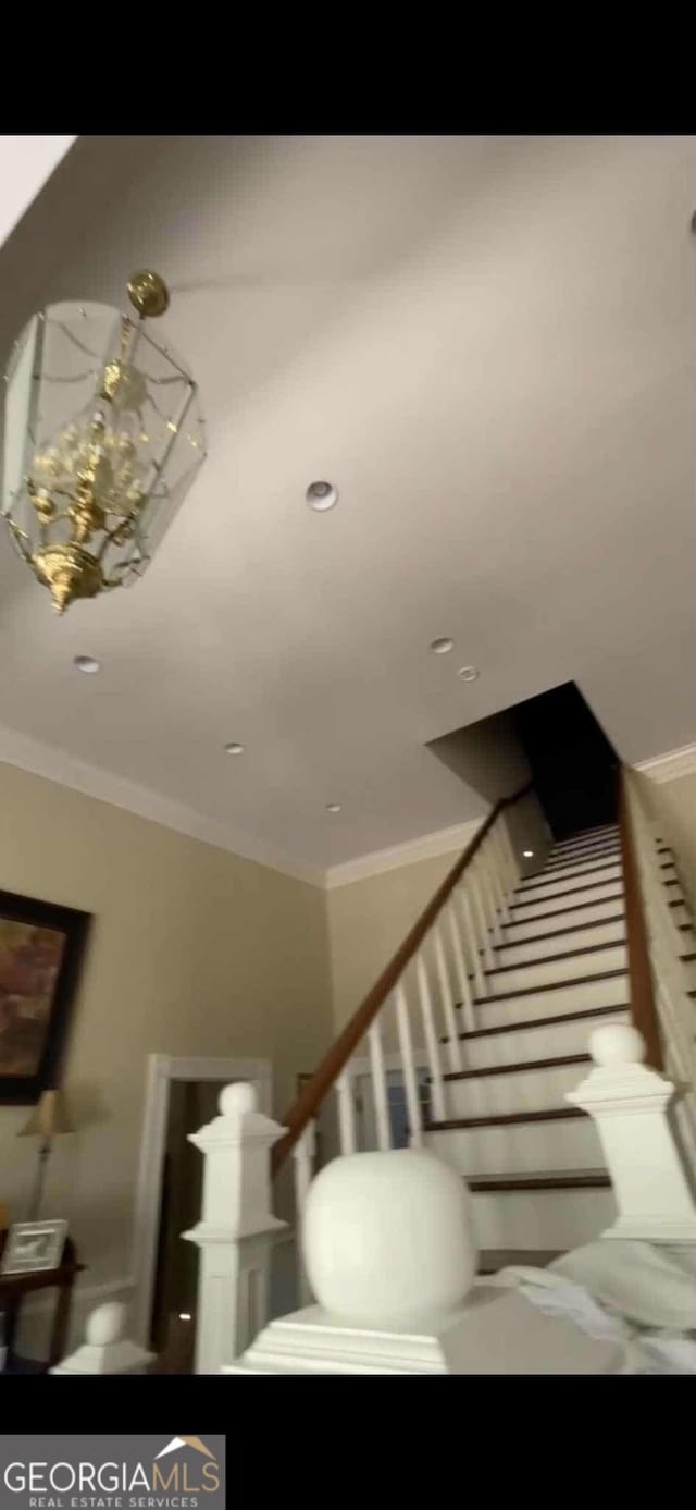 4922 Van Cise Ln, Albany, GA 31721 - staircase featuring crown molding