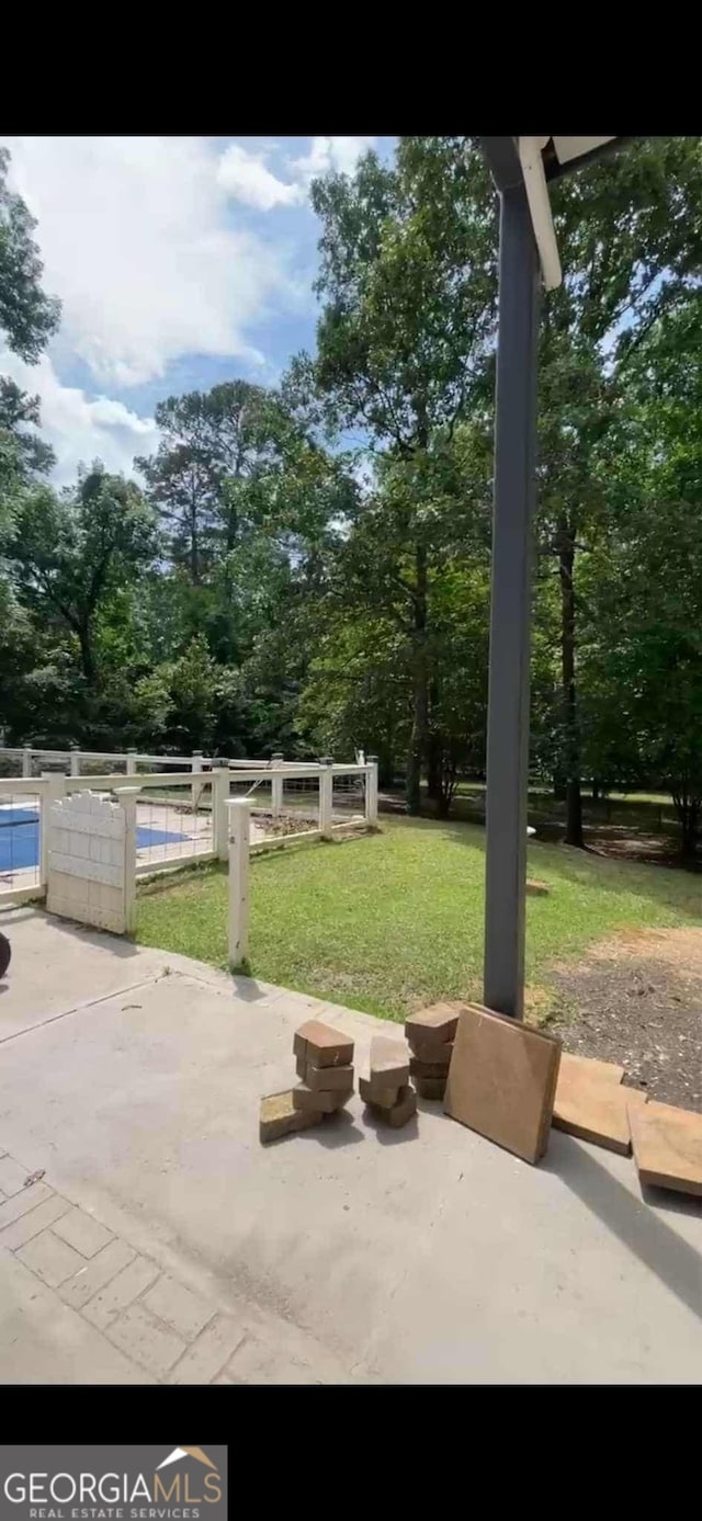 4922 Van Cise Ln, Albany, GA 31721 - view of patio featuring view of scattered trees