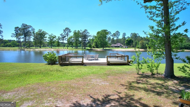 114 N Valhalla Dr, Cordele, GA 31015 - dock with a lawn, a deck with water view, and view of scattered trees
