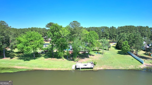 114 N Valhalla Dr, Cordele, GA 31015 - drone / aerial view of a nearby body of water and a heavily wooded area