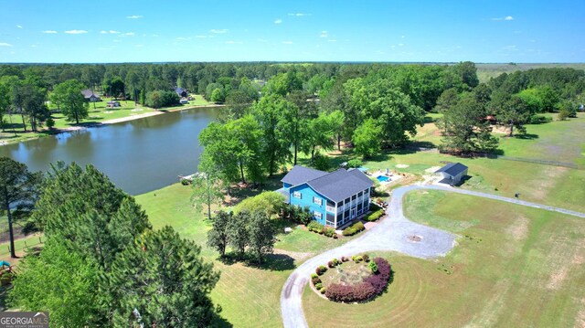 114 N Valhalla Dr, Cordele, GA 31015 - drone / aerial view of a large body of water and a heavily wooded area