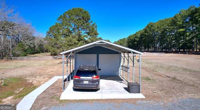114 N Valhalla Dr, Cordele, GA 31015 - view of outdoor structure featuring fence and a detached carport