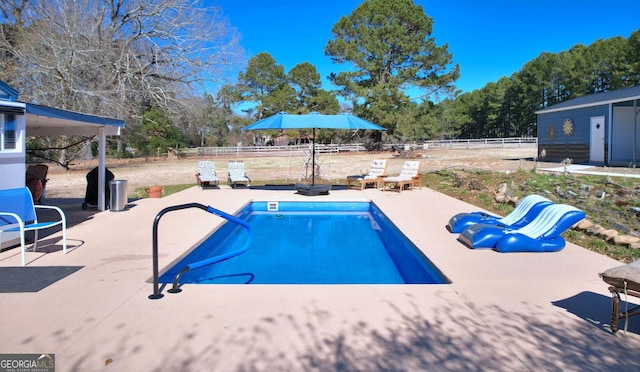 114 N Valhalla Dr, Cordele, GA 31015 - outdoor pool featuring a patio and a fenced backyard
