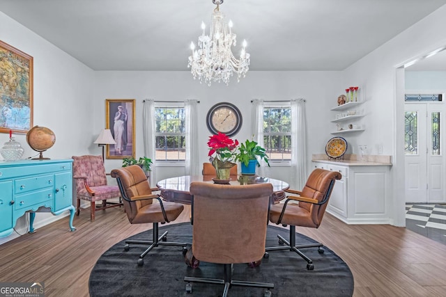 114 N Valhalla Dr, Cordele, GA 31015 - dining room with wood finished floors, plenty of natural light, and a chandelier