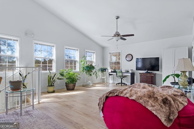 114 N Valhalla Dr, Cordele, GA 31015 - bedroom with wood finished floors, baseboards, high vaulted ceiling, and a desk