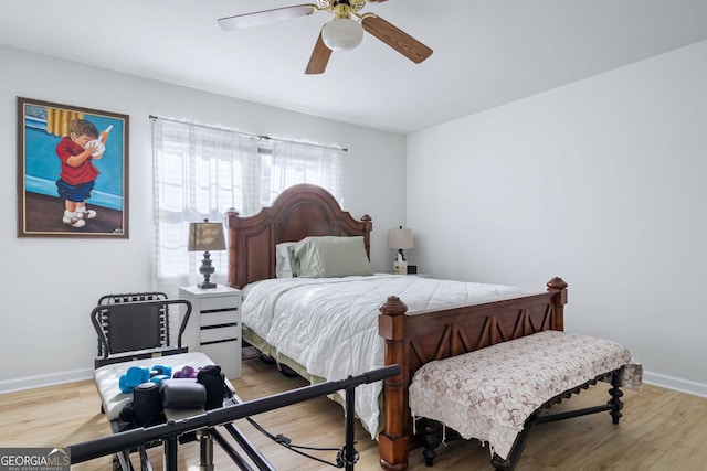 114 N Valhalla Dr, Cordele, GA 31015 - bedroom with baseboards, light wood-type flooring, and ceiling fan