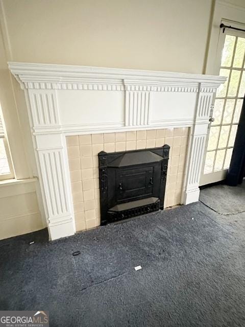 210 W Church St, Swainsboro, GA 30401 - detailed view of a fireplace and carpet flooring