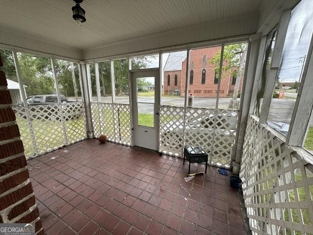 210 W Church St, Swainsboro, GA 30401 - unfurnished sunroom featuring plenty of natural light