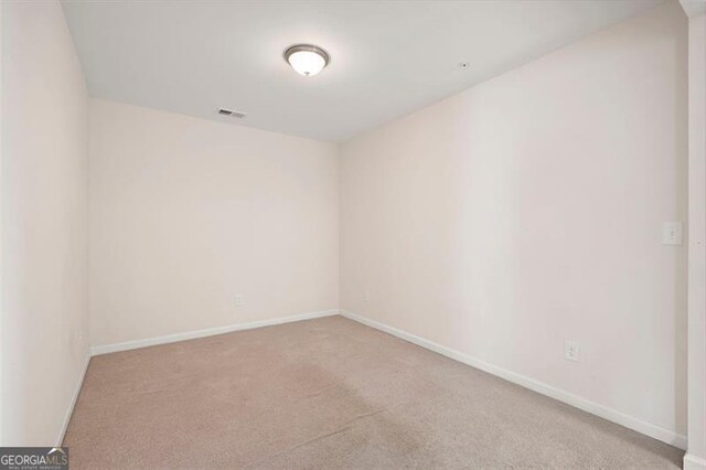 1957 Brightleaf Way Unit 59, Marietta, GA 30060 - carpeted empty room featuring baseboards